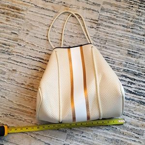 01 cream  shoulder bag from Haute  Shore